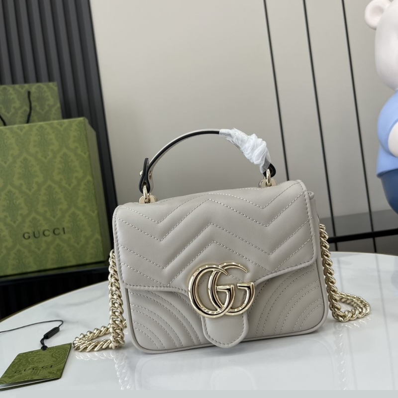 G*u*i top handle bags